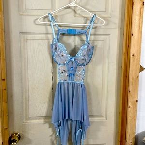 Light blue lingerie with a flowered pattern. Never worn without tags.
